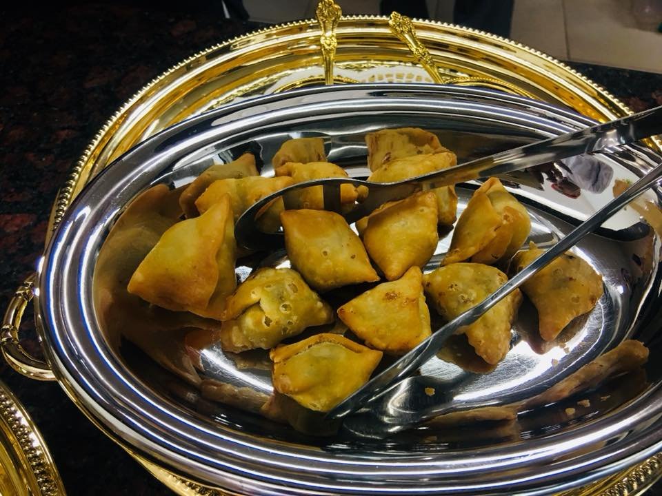 Cocktail samosas served in a silver tray
