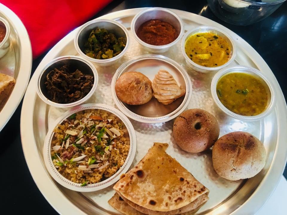 Royal Rajasthani thali with dal, sabzi, bati and paratha